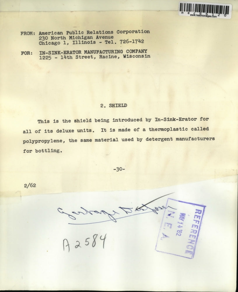 1962 Press Photo A shield being introduced by Ink-Sink Erator for all of its del