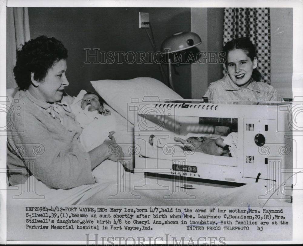 1954 Press Photo Mary Lou in the arms of her mother Mrs. Raymond Stilwell