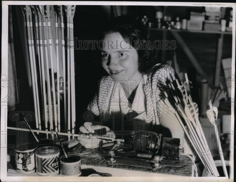 Load image into Gallery viewer, 1935 Press Photo Mrs. Lena Gunn works on bow and arrows Los Angeles Ca.
