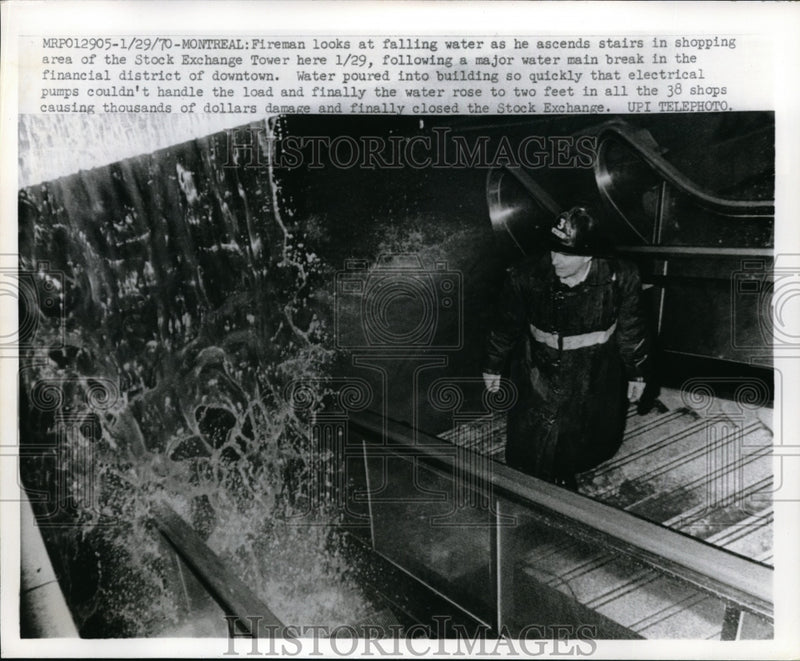 Load image into Gallery viewer, 1970 Press Photo Montreal, Canada fireman at Stock Exchange Tower fire scene
