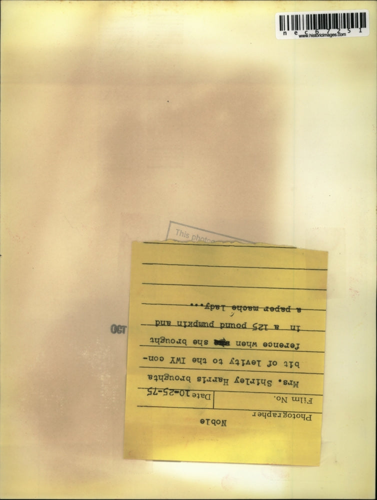 1975 Press Photo Mrs Shirley Harris at IWY conference with pumpkin & dummy