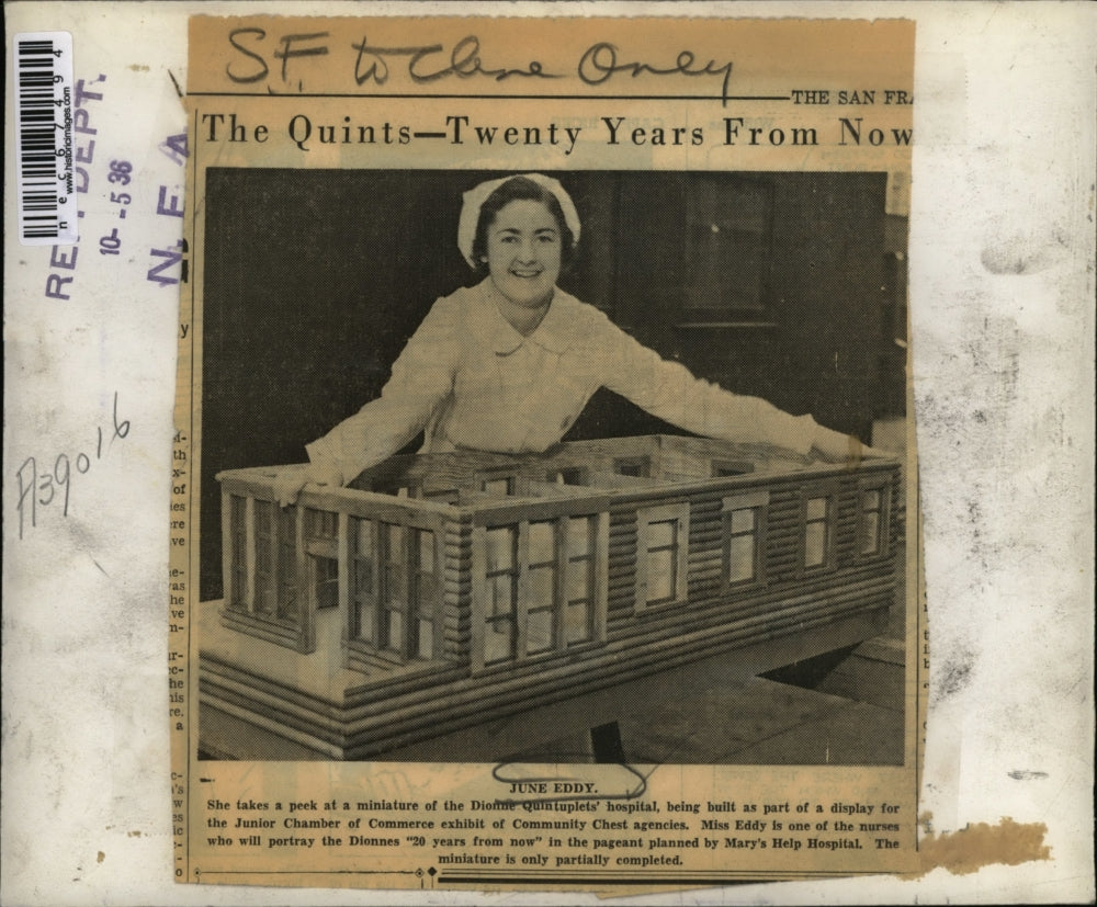 1936 Press Photo Nurse June Eddy Looks At Model Of New Hospital