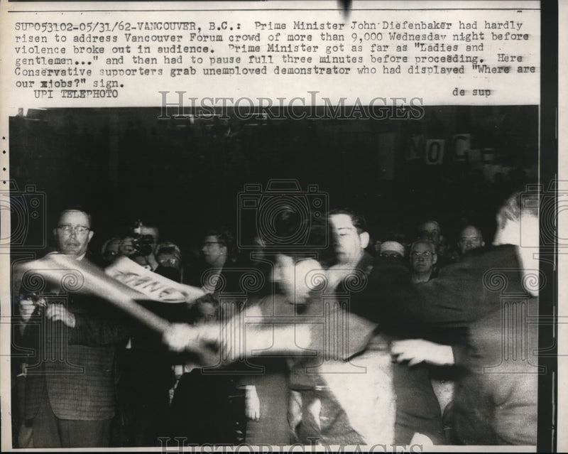 Load image into Gallery viewer, 1962 Press Photo Scene from the violence in the Vancouver forum where Prime Mini
