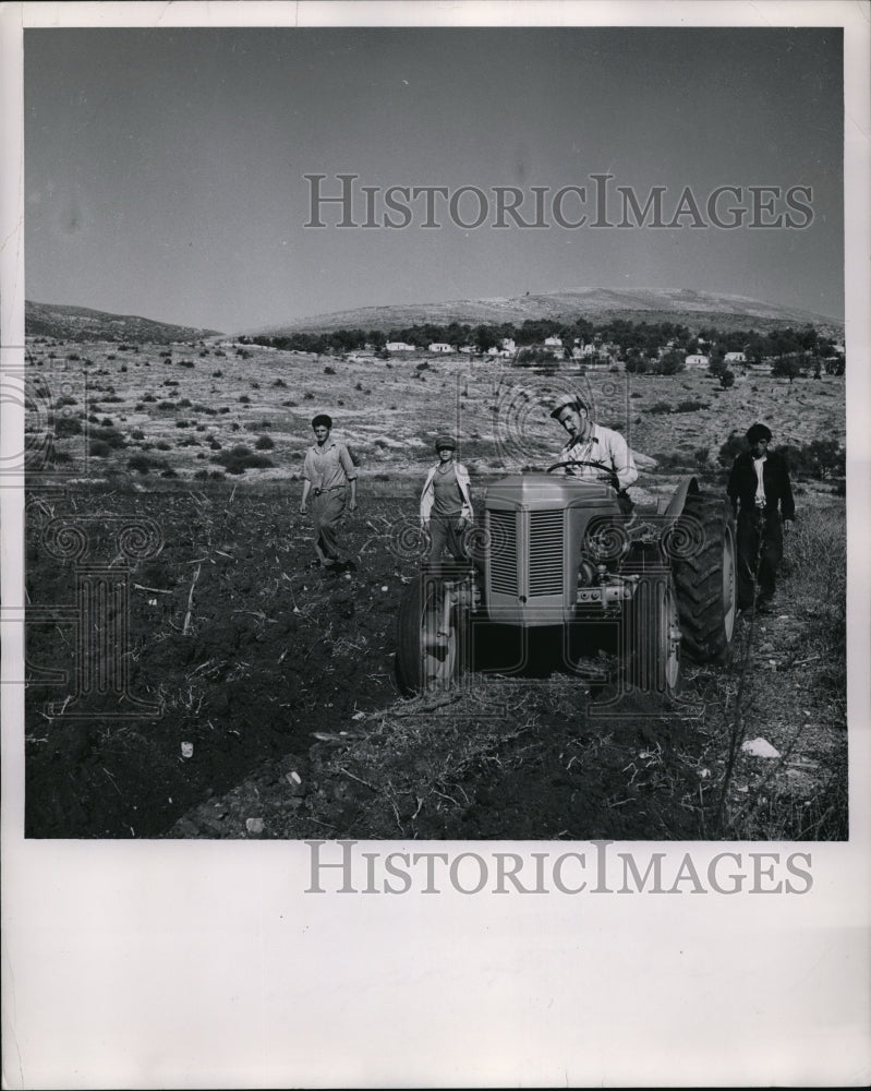 1953 Press Photo Greek village farmers plowing fields with a tractor- Historic Images