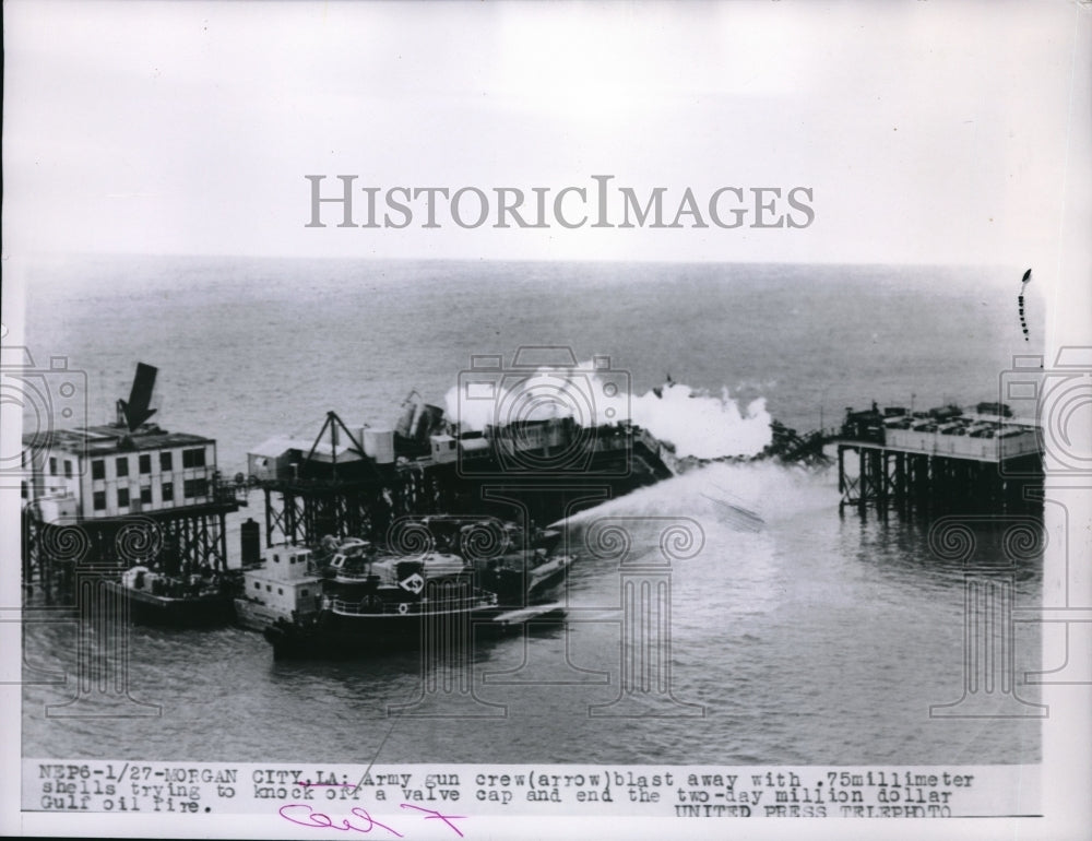 1953 Press Photo Army gun crew blast with .75 millimeter shells Morgan City, LA.