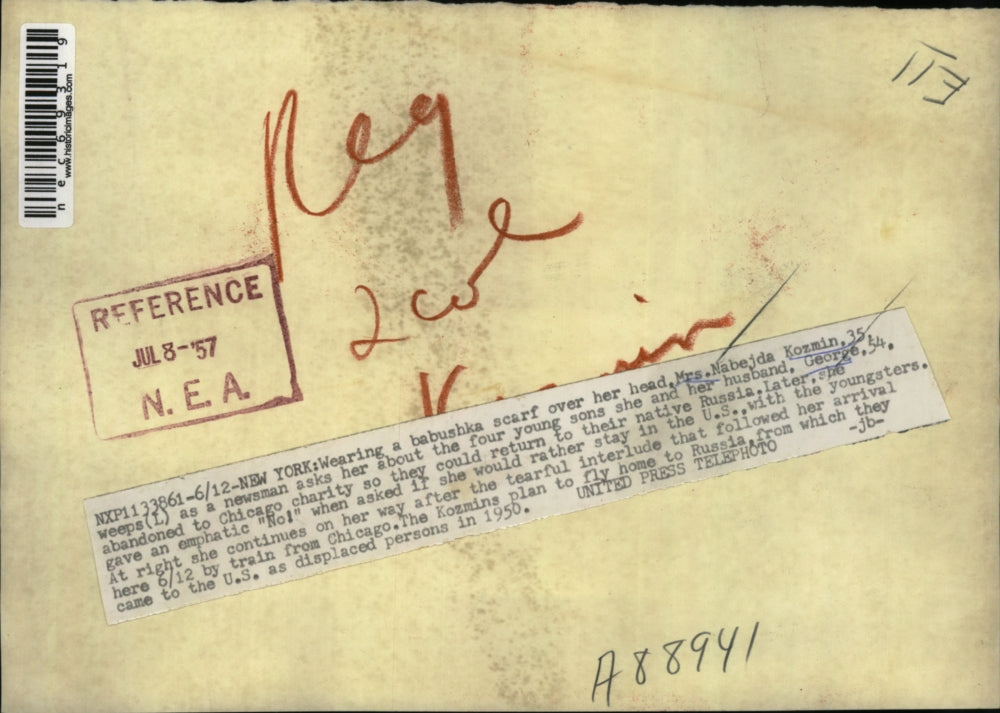 1957 Press Photo Nabejda Kozmin weeps as a newsman asks her about her sons she