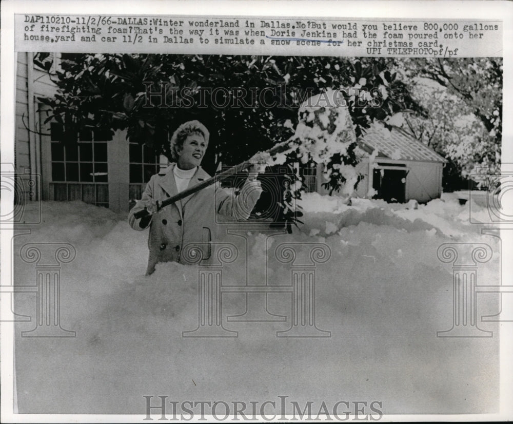 1966 Press Photo Doris Jenkins Shovels Firefighting Foam From Yard