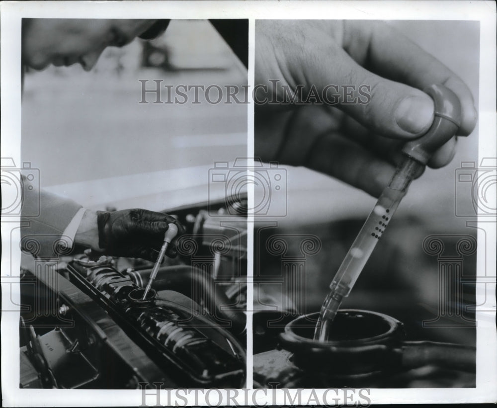 1969 Press Photo Battery Tester reveals the amount of charge left in a battery.