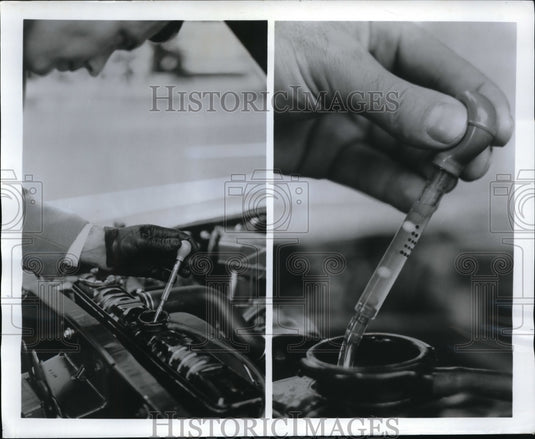 1969 Press Photo Battery Tester reveals the amount of charge left in a battery.