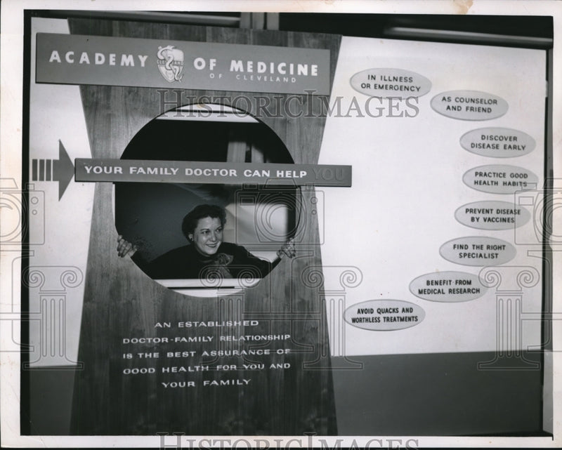 Load image into Gallery viewer, 1956 Press Photo Dorothy Cummins of East Cleveland at Herald Exhibit of Health
