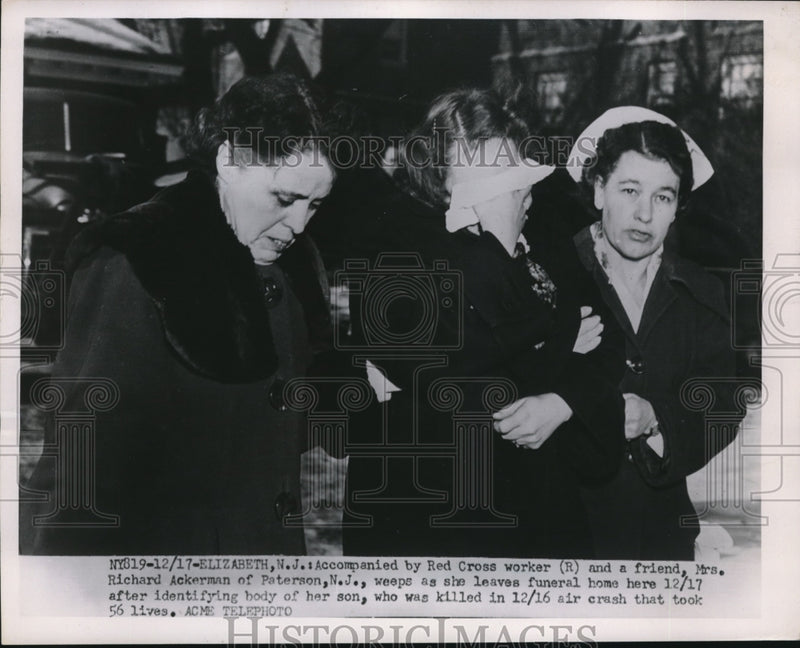 Load image into Gallery viewer, 1951 Press Photo Red Cross Worker &amp; Mrs Richard Ackerman Identifies Son Killed
