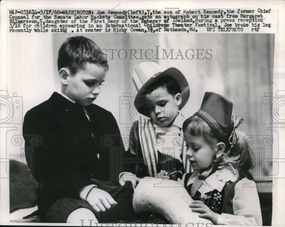 1960 Press Photo Joe Kennedy Has Cast Signed by Margaret Hilmarsson
