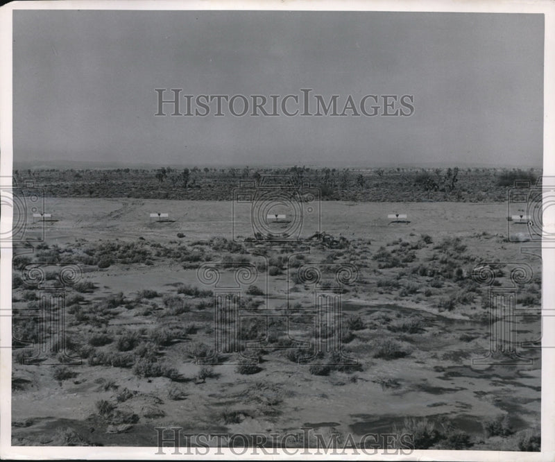 Load image into Gallery viewer, 1950 Press Photo markers along the pilot ejection seat test track at Edwards AFB

