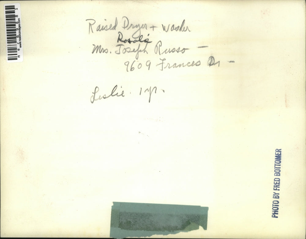 Press Photo Mrs. Joseph Russo & Daughter Leslie with Raised Washer & Dryer