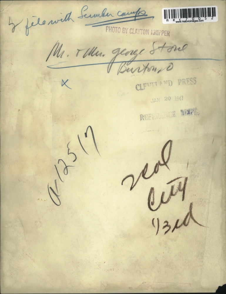 1947 Press Photo Mr. and Mrs. George Stone Cutting Wood in Lumber Camp in Burton