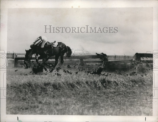 1938 Press Photo Cowbow & his horse crash thru a fence