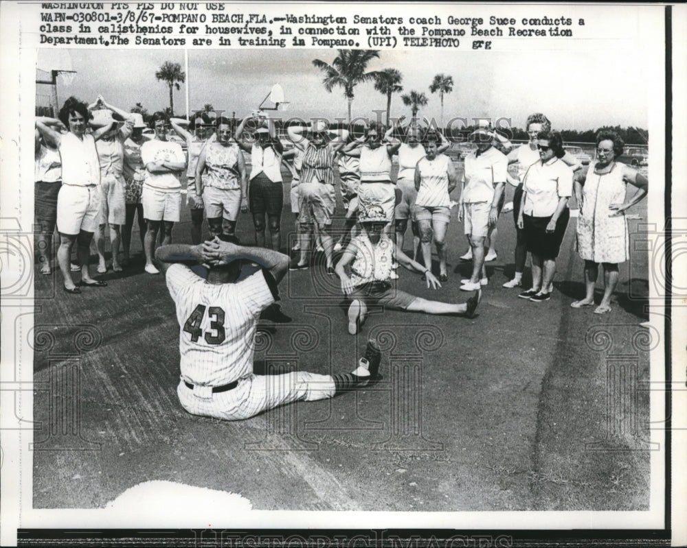 1967 Press Photo Senators' coach George Suce teaches calisthenics to housewives