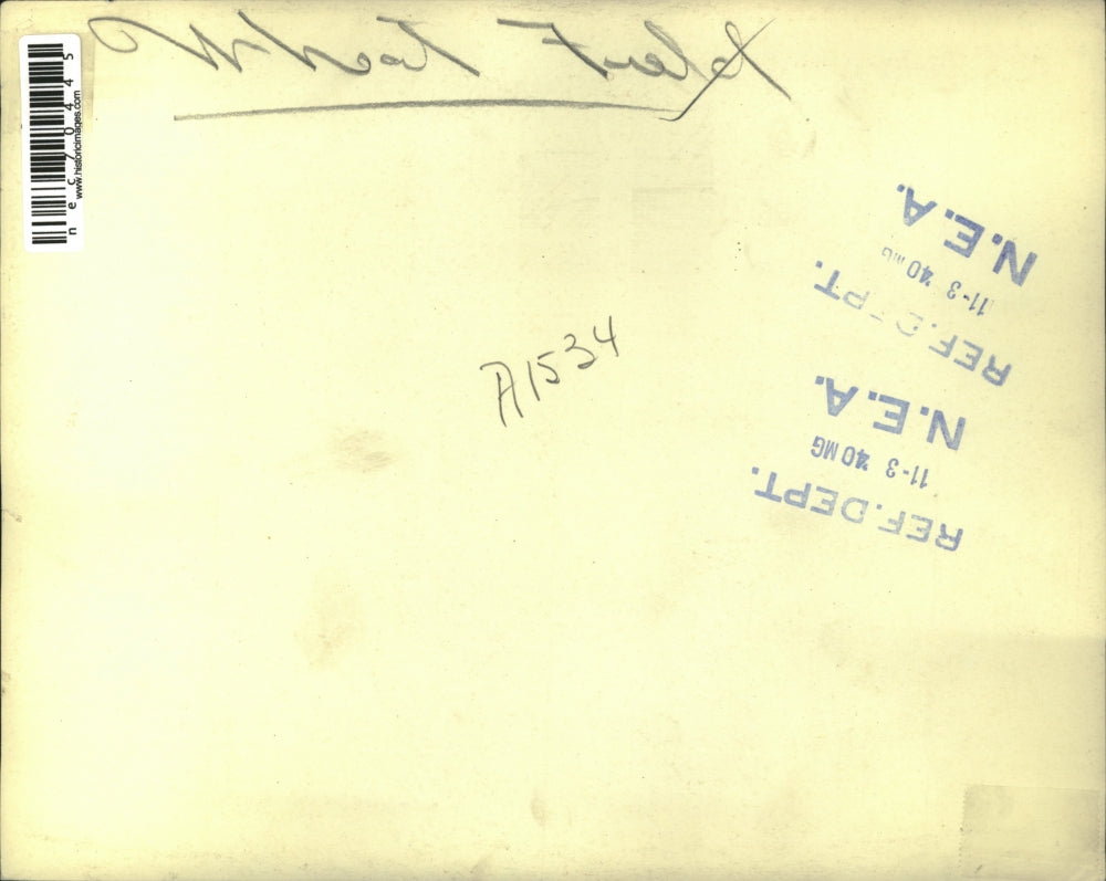 1940 Press Photo A wheat field as harvesters pass through it