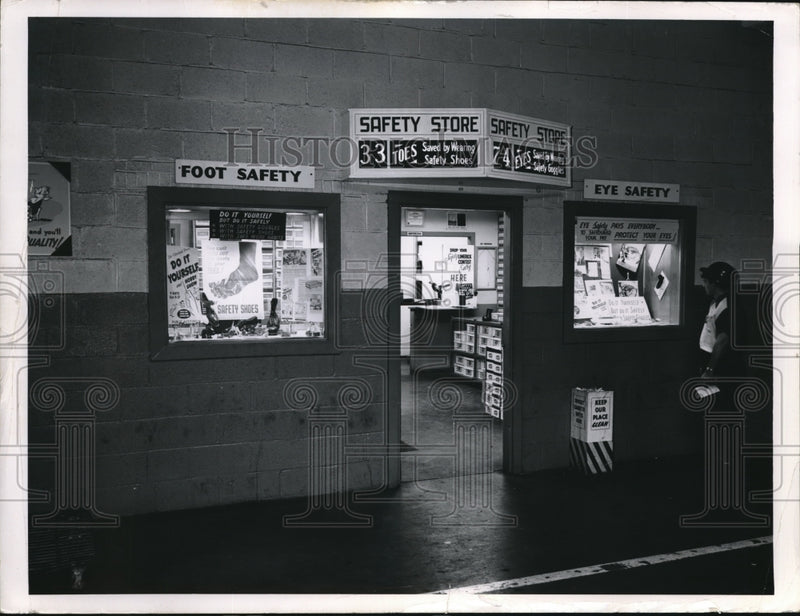 Load image into Gallery viewer, 1954 Press Photo Safety store front display with eye &amp; foot protective gear
