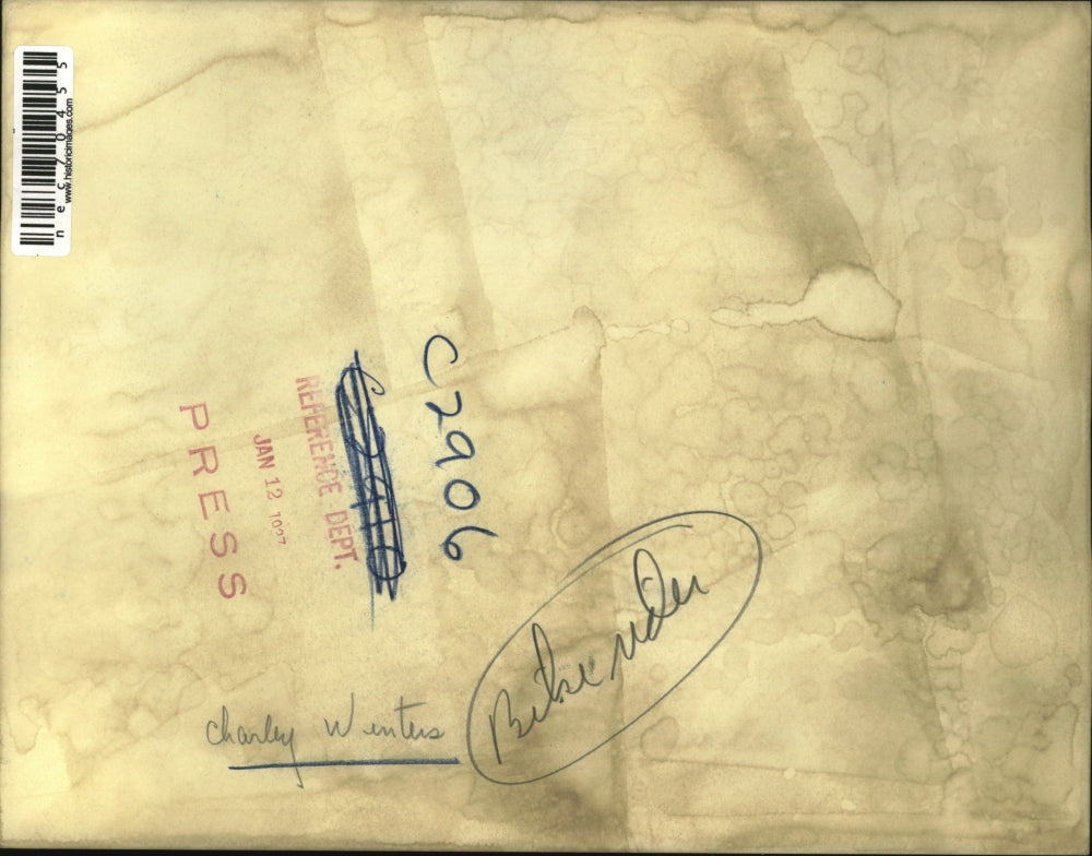 1937 Press Photo Charley Winters at work in front of typewriter