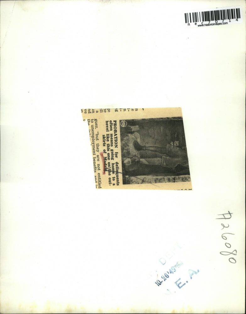 Load image into Gallery viewer, 1949 Press Photo Madrid, Spain young boy in his poor hovel of a home
