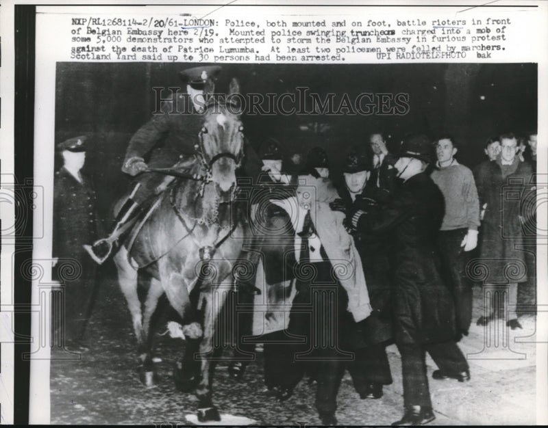 Load image into Gallery viewer, 1961 Press Photo London police battle rioters at Belgian Embassy
