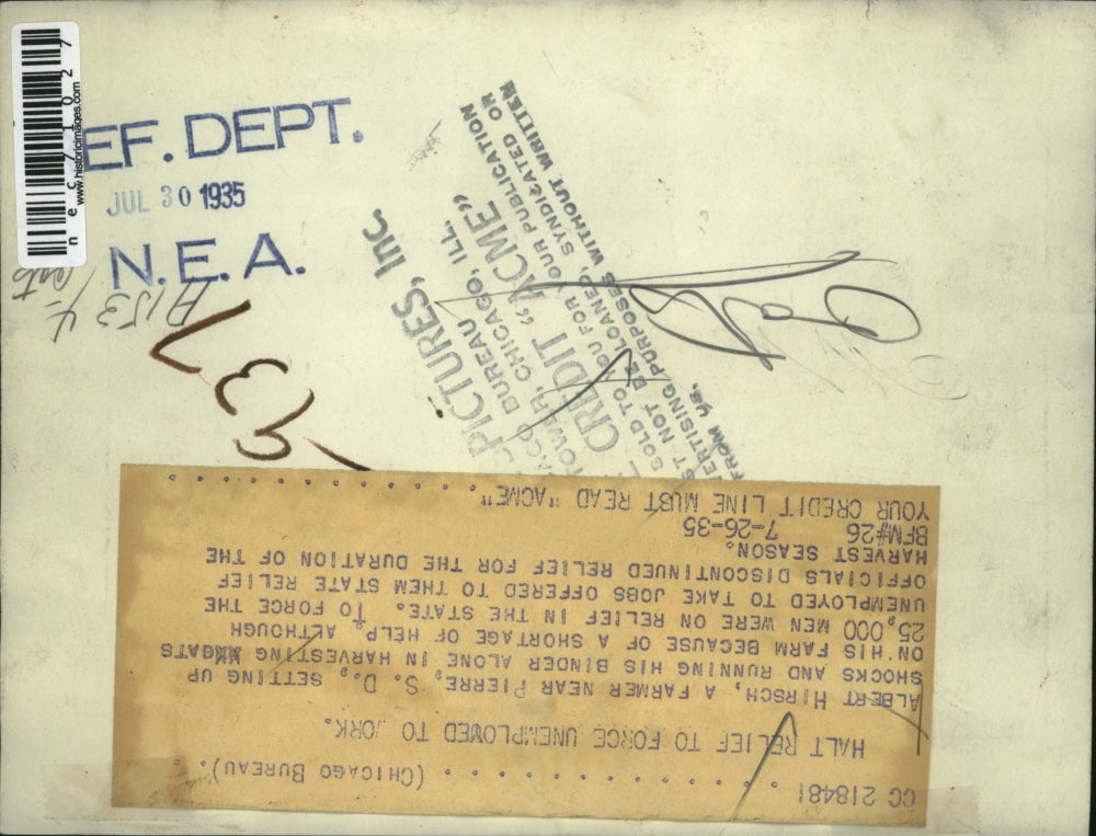 1935 Press Photo Albert Hirsch, farmer near Pierre, SD with his binder machine