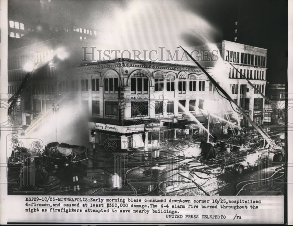1954 Press Photo Minneapolis, MN firemen battle blaze in downtown area