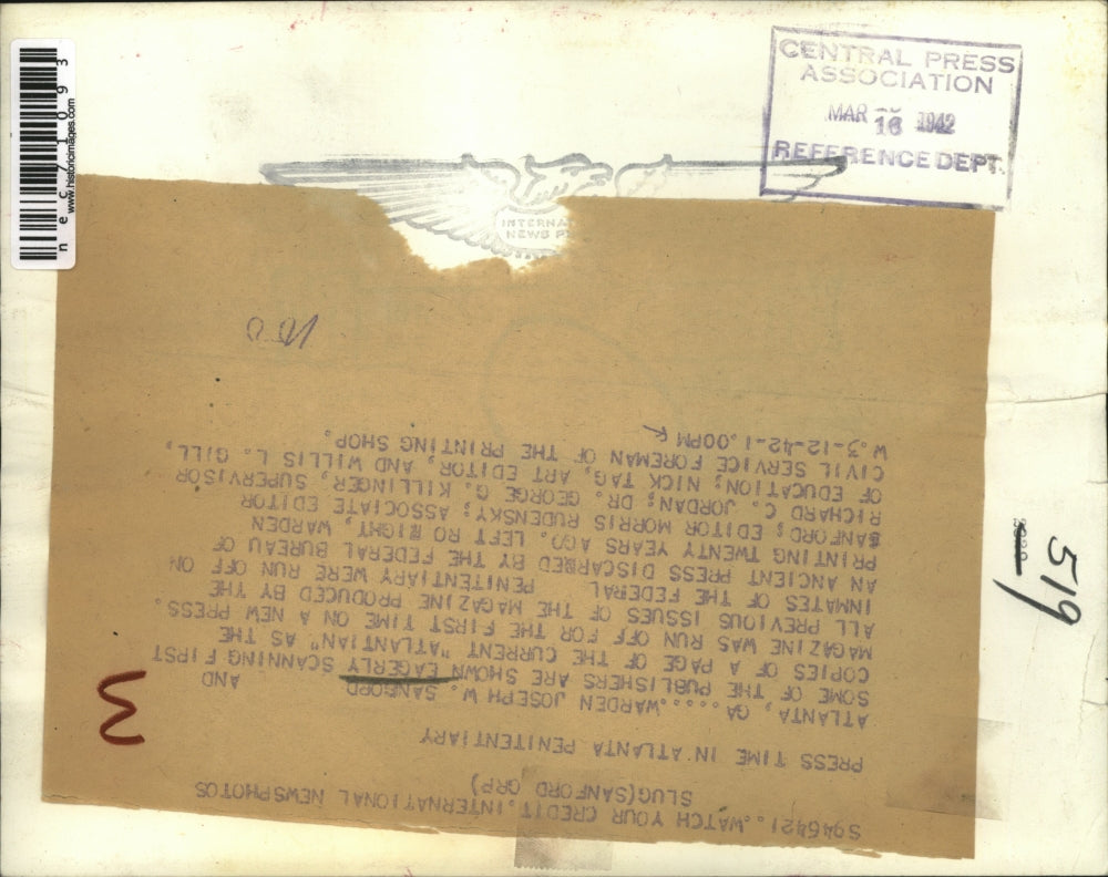 1942 Press Photo Warden Joseph Sanford Scans Copies of Atlantian on New Press