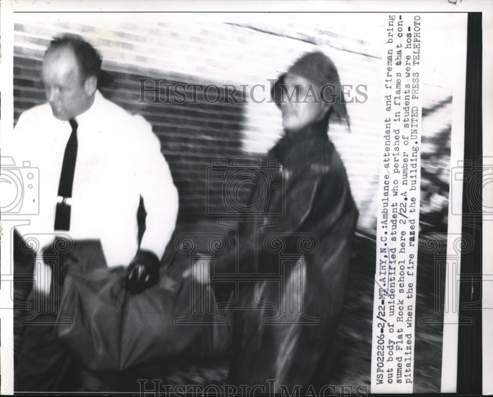 1957 Press Photo Unidentified Student Body is carried From Flat Rock School