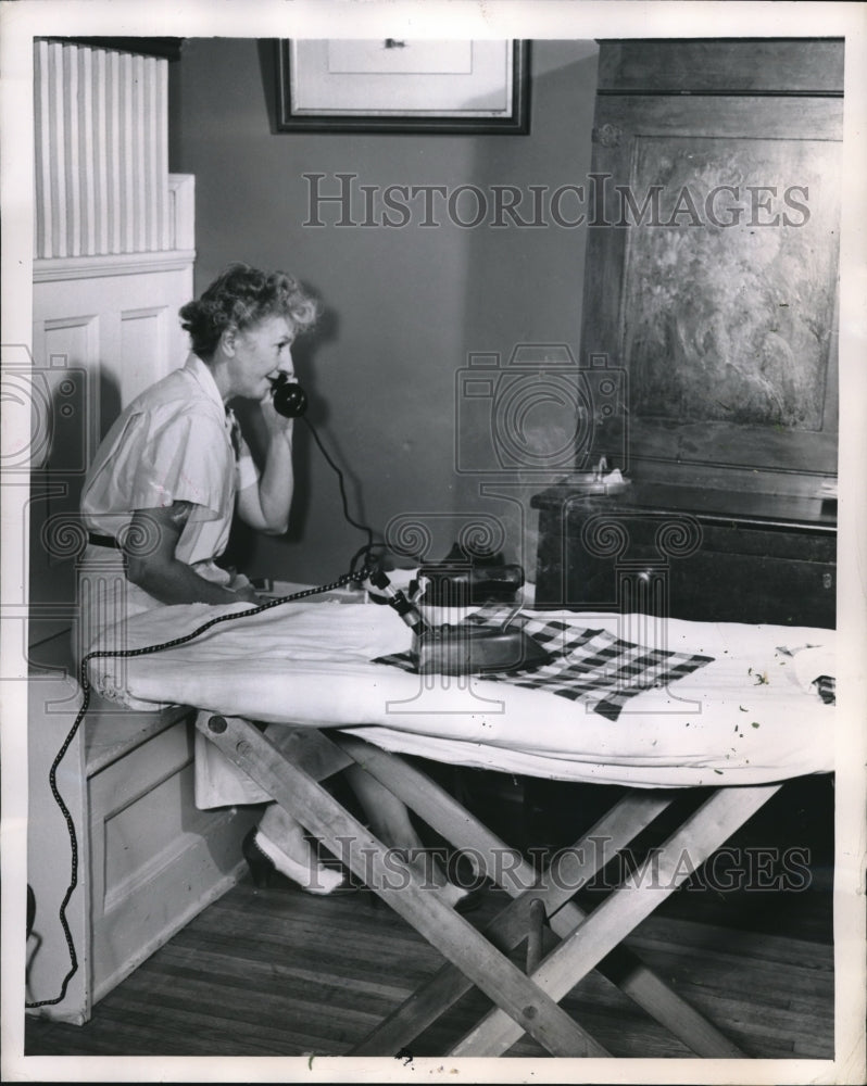 1947 Press Photo Fire Prevention Week, Housewife Leaves Iron On