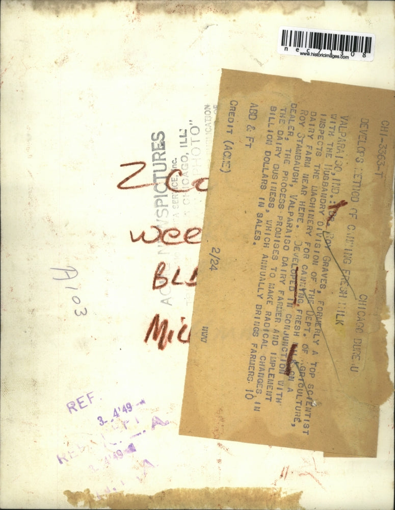 1949 Press Photo Dr. Roy Graves Inspects Machinery for Canning Fresh Milk