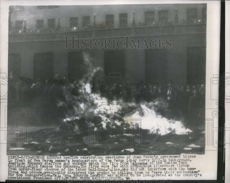 Load image into Gallery viewer, 1955 Press Photo Bonfire Celebrating Overthrow of Juan's Peron's Government
