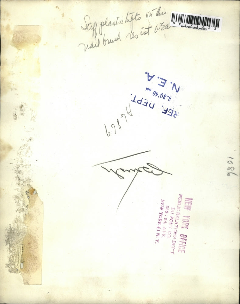 1946 Press Photo durable plastic nail brush demonstrated