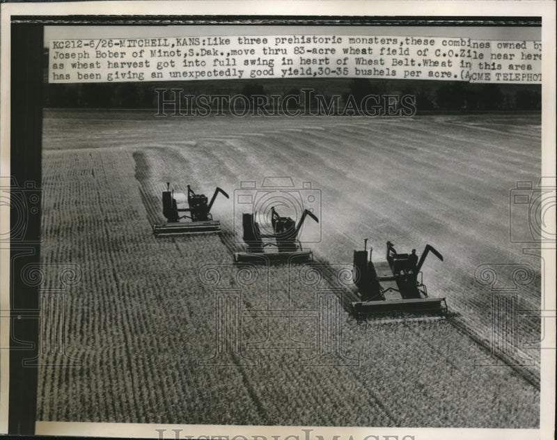 Load image into Gallery viewer, 1950 Press Photo combines owned by Joseph Bober work in wheat field - nec72247
