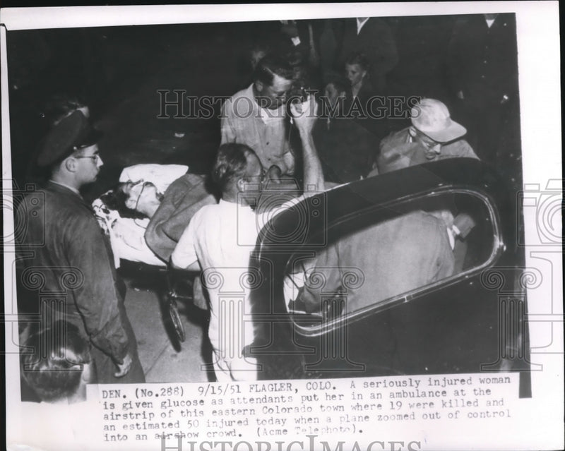 Load image into Gallery viewer, 1951 Press Photo Woman Attended to After Injured at Colorado Air Show
