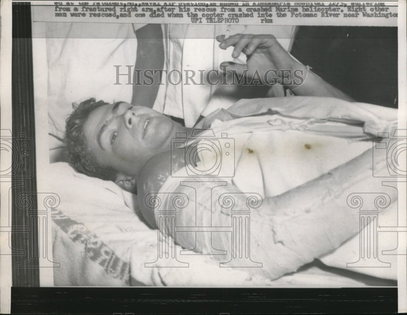 Load image into Gallery viewer, 1958 Press Photo Wounded man from a helicopter crash taken to hospital
