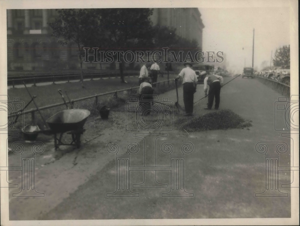 1936 Press Photo workers repairing sidewalk behind city hall