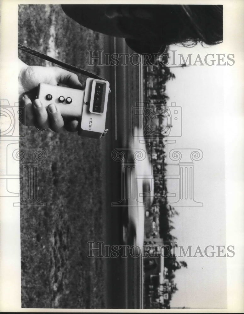 Load image into Gallery viewer, 1971 Press Photo NY auto clocked by a Seiko handheld electronic timer
