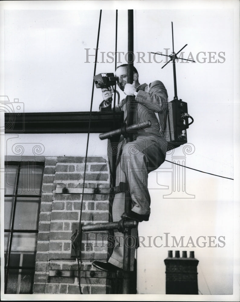 Load image into Gallery viewer, 1960 Press Photo British broadcaster Brian Johnston with portable TV camera
