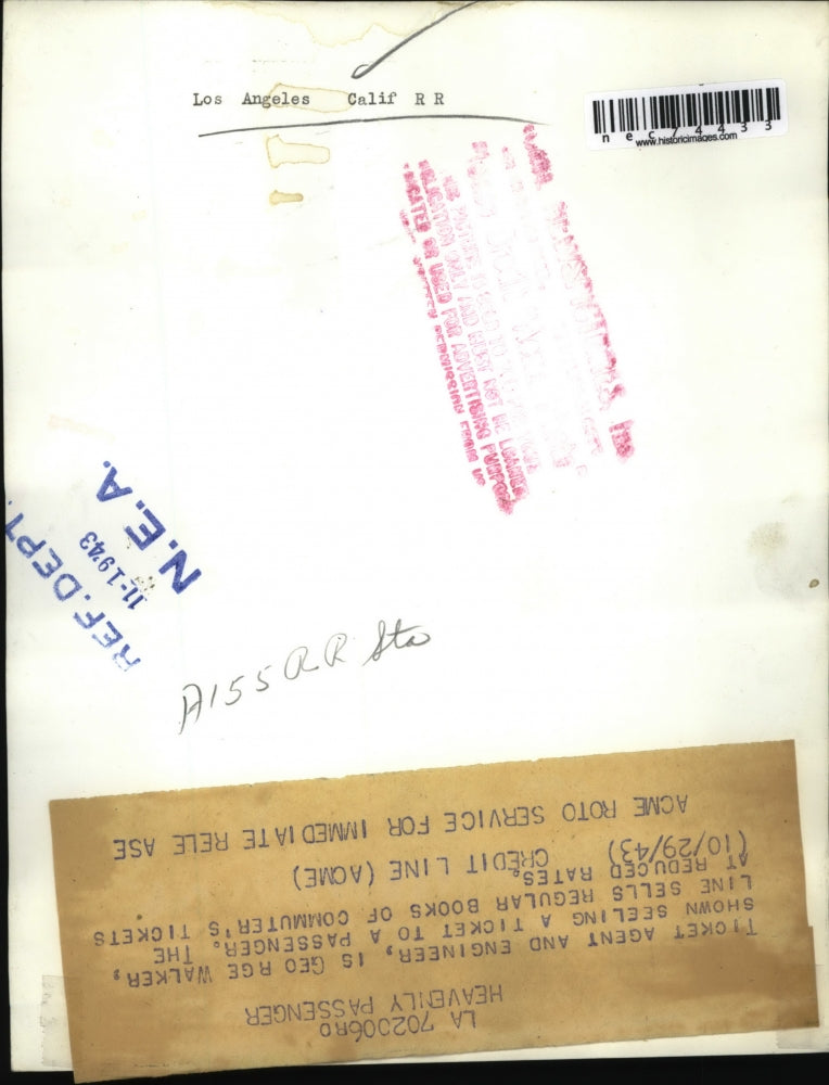 1943 Press Photo George Walker selling train ticket to customer