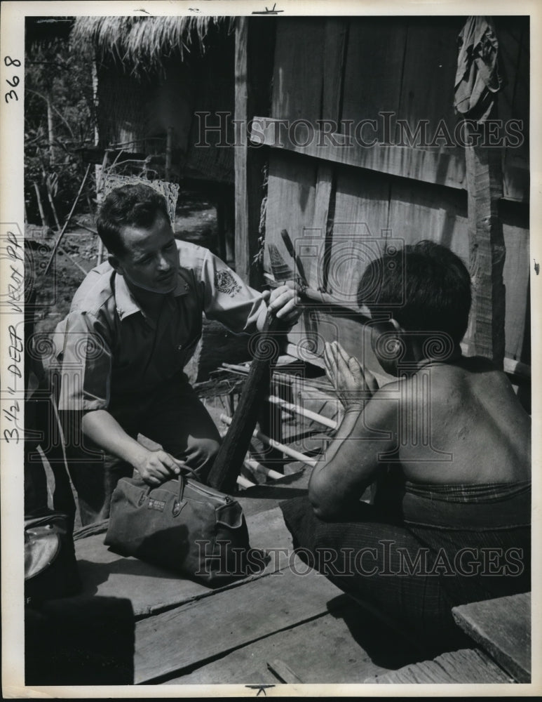 Load image into Gallery viewer, 1962 Press Photo Dr Ramon Miguel with WHO at a leper village
