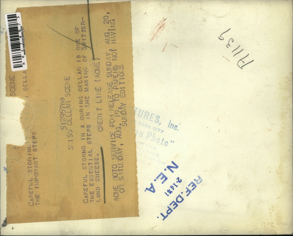 1941 Press Photo Wheels of cheese on shelves in Switzerland