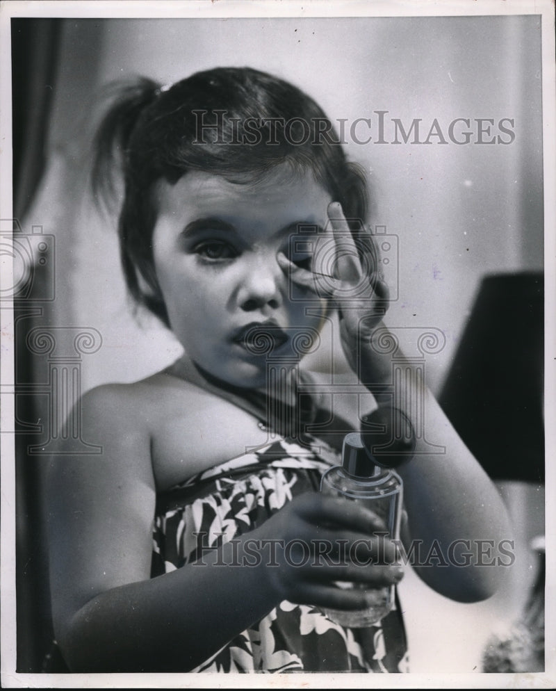 Load image into Gallery viewer, 1953 Press Photo Molly McCreary with Bottle of Perfume
