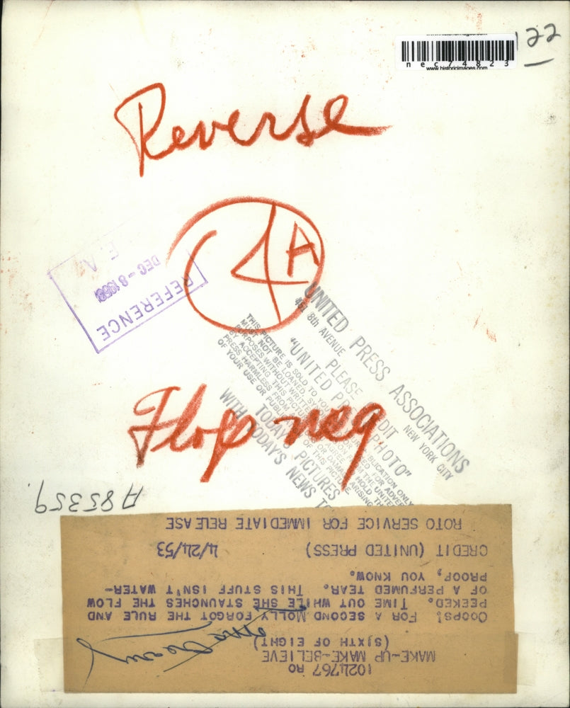 1953 Press Photo Molly McCreary with Bottle of Perfume