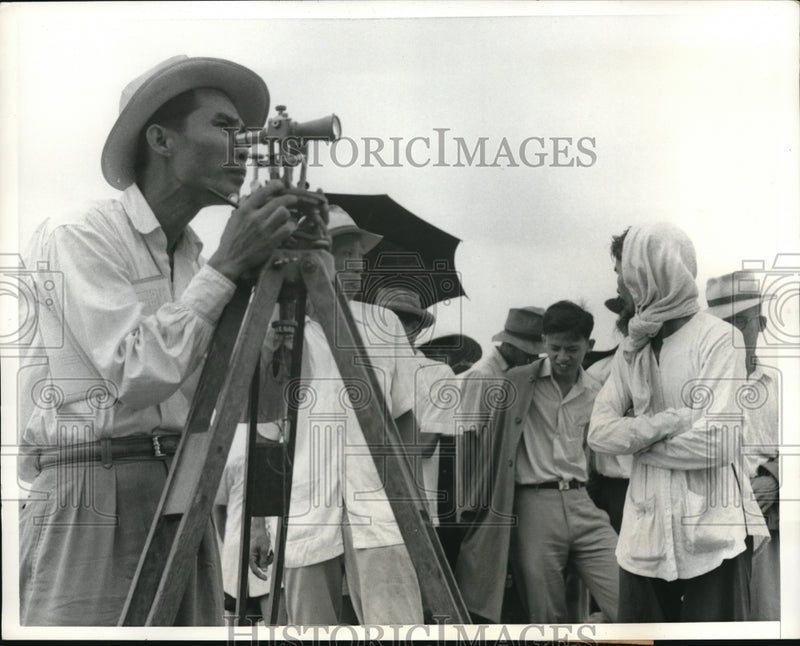 Load image into Gallery viewer, 1957 Press Photo Surveyor sets lines for tenant farmers of 3 hectares
