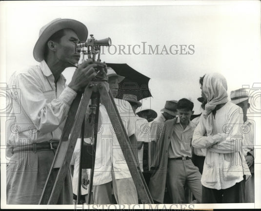 1957 Press Photo Surveyor sets lines for tenant farmers of 3 hectares