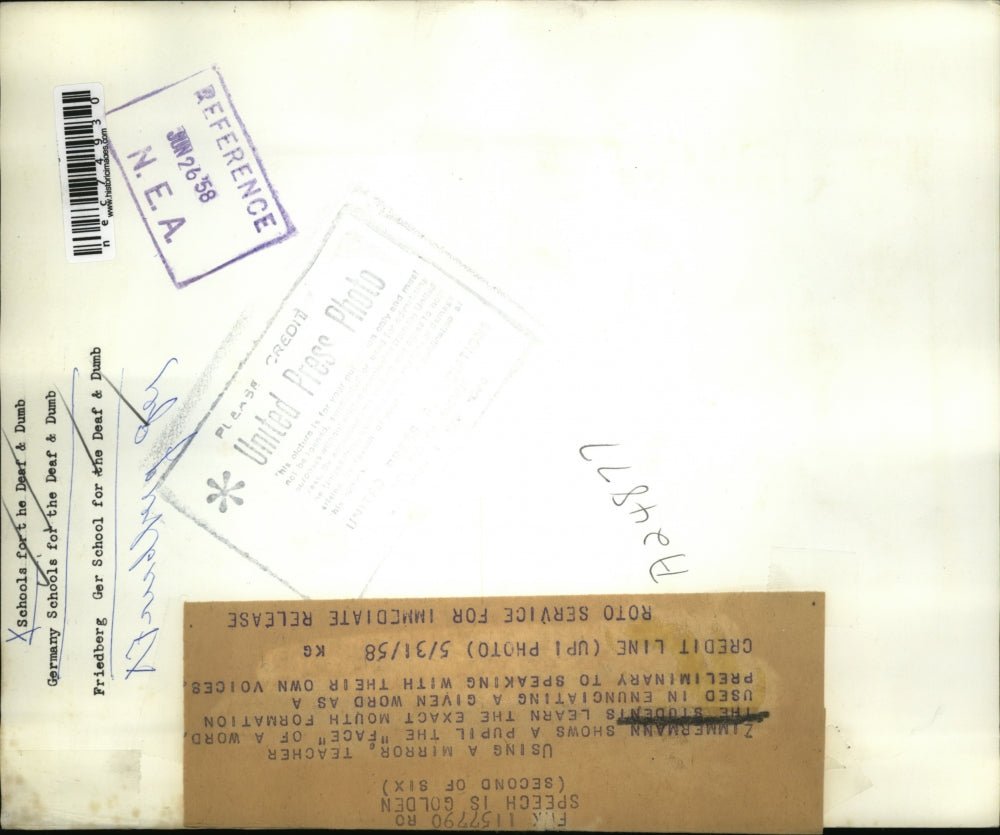 1958 Press Photo Teacher Zimmermann teaches deaf how to speak German school