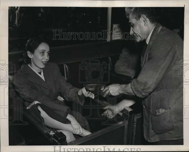 Load image into Gallery viewer, 1940 Press Photo Shoe repairman &amp; a lady getting heels fixed
