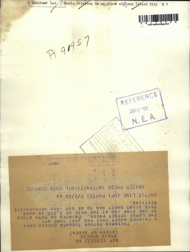 1960 Press Photo pressman Arthur Tosques checks music sheet fresh off the press